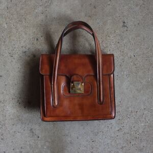 Vintage Cognac Genuine Leather Hand Bag Brass Turn Lock Satchel Quiet Luxury